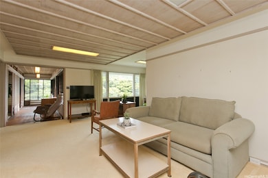 Front door view to living room and enclosed lanai