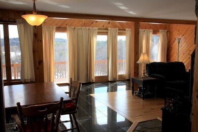 Views surround the living and dining...