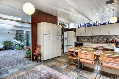 To the right of the formal living room you will fi