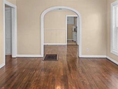 Good Size Living Room with the original hardwood f