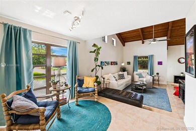 Living room with upper sitting area across from ki