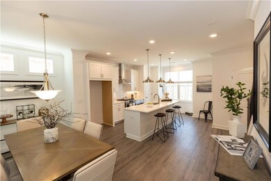Welcome Home to Market Square at Sawnee Village!  *Photos are of stagged home. Photos shown are not actual unit.*