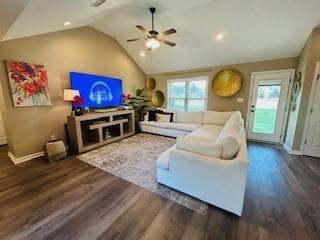 Living area featuring vaulted ceiling, dark wood finished floors, a ceiling fan, and recessed lighting