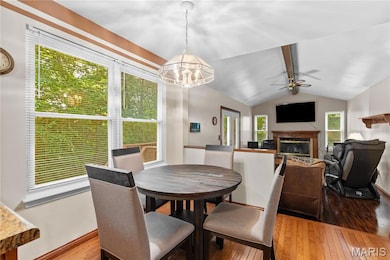 Gleaming hardwood flooring flows from your kitchen prep area into the eat-in portion of the kitchen.