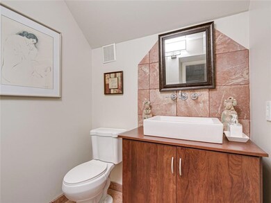 Powder Room next to Foyer Entrance