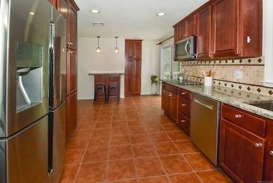 Renovated kitchen with top of the line refrigerator and two ovens!