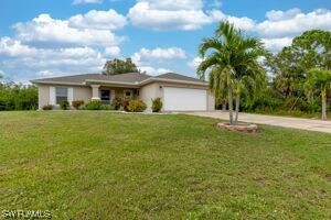 740 Goldrock Rd, Lehigh Acres, FL 33974 - photo 3