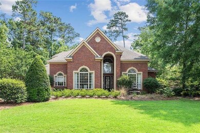 Lush Landscaping in front with Gardenias and Fount