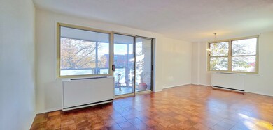 Formal dining room has access to the screened-in balcony