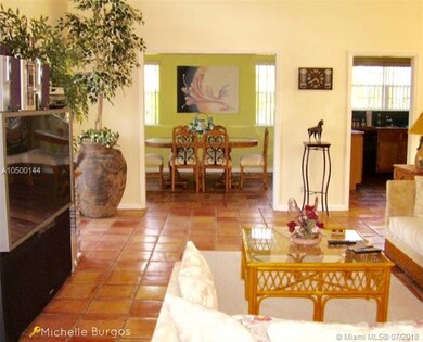 The large family room is adjacent to the formal di