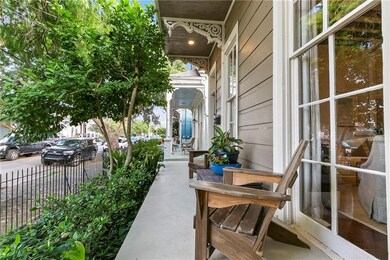 Tons of charm on this serene front porch with many