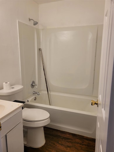 Full bath featuring vanity, toilet, bathing tub /