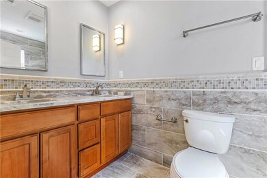 Double vanity in the primary bathroom. Lots of det