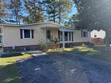 View of front of property featuring a front yard a