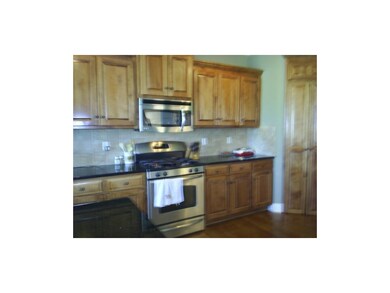 kitchen has all stainless steel appliances and is 