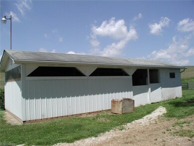 Horse Barn w/3 stalls plus a summer kitchen