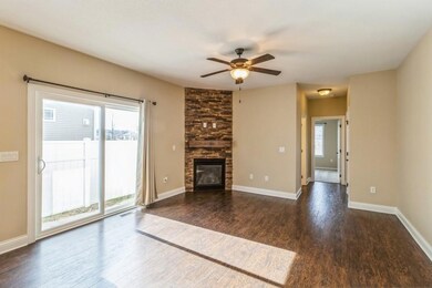 Floor to Ceiling Stone Fireplace with electric for