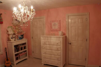 spacious with two closets, also has entrance in closet to attic storage. 