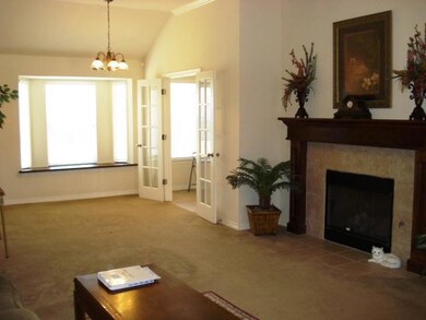 Living Room. Beautiful fireplace with gas logs.