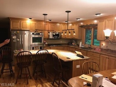 All stainless appliances= double ovens, microwave,