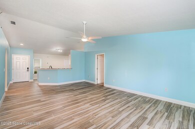 Living Area.Kitchen.Master Doorway