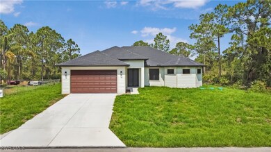 View of front of property with an attached garage,