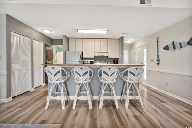 Looking into the kitchen,  breakfast bar area, SS 