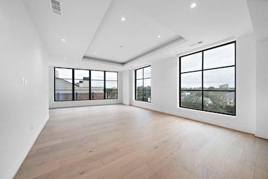Living room: The exquisite light wood floors enhan