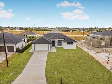 View of front of home with a residential view, dri