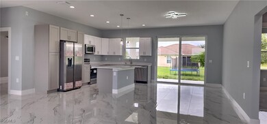 Kitchen featuring stainless steel appliances, a ce