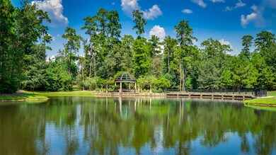 Welcome to behind the gates living in Carlton Woods Creekside, where you will find beautiful lakes and ponds throughout.