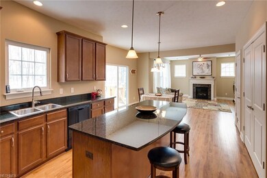 Granite counters and Huge Island with Open Floor P