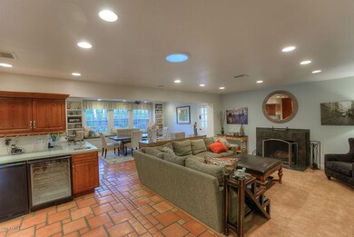 Family room, bar and fireplace
