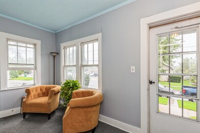 Enclosed porch for access to both units.