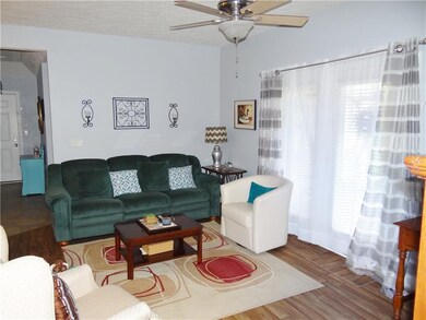 Living room and door leading to the sun porch
