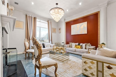Living room featuring visible vents, baseboards, o
