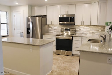 12581 Kelly Sands Way unit 504, Fort Myers, FL 33908 - photo 5