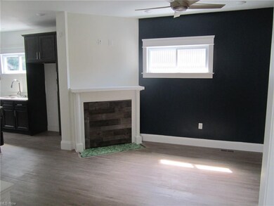 Living room view of decorative fireplace