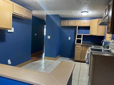 Kitchen from Basement Staircase