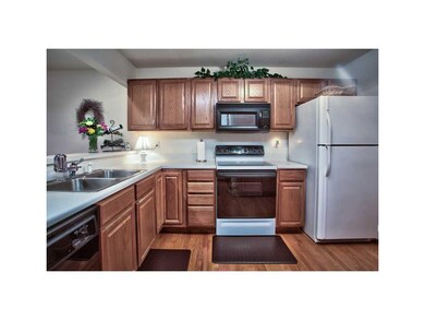 Kitchen. CLEAN AND NEUTRAL WITH HARDWOOD FLOORING