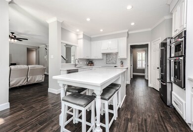 Entertainers dream with this incredible open floor plan layout combining the breakfast nook, kitchen and livingroom