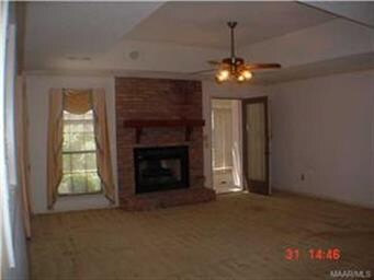 Greatroom with treyed ceiling, centered fireplace 