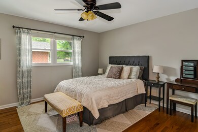 This seren master bedroom features a 1/2 bath and 