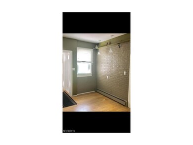 Entrance by back door.  Great mud room space or di