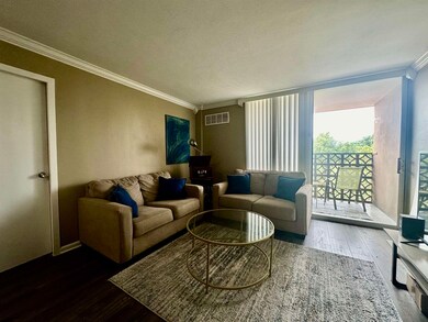 Living room featuring hardwood / wood-style floori