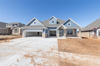 Craftsman-style house featuring covered porch, roo