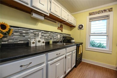 Updated bright and cheery kitchen with ceramic bac