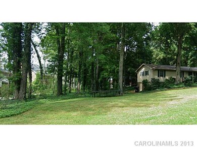Other - Vacant lot to the left of house -- house l