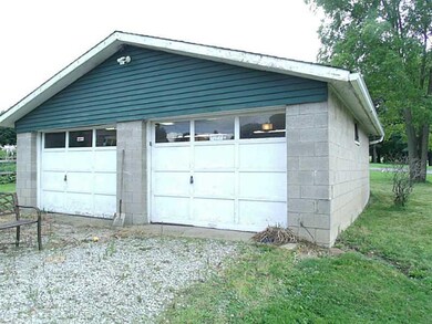 Exterior Back. Detached oversized two car 24x24 ga