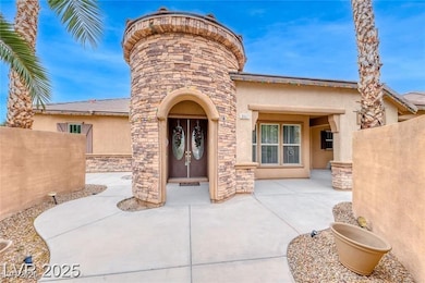 Entrance to property featuring stucco siding and s